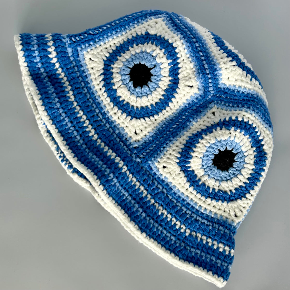 Blue, White & Black Hand Made Evil Eye Crochet Bucket Hat By The Stitch Fairy Crochet Evil Eye Bucket Hat With Blue Tones for Boho Style  main image 2